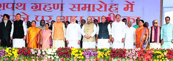 Prime Minister Narendra Modi (centre) flanked by venteran leader LK Advani and national party chief Amit Shah at the swearing-in ceremony of Haryana Chief Minister Manohar lal Khattar in Panchkula. Also seen in the picture are senior leaders of the BJP