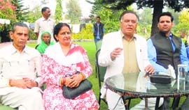 Transport Minister GS Bali addresses a press conference in Kangra on Sunday.