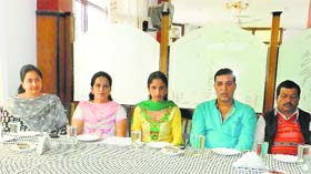 Namita Sharma (Centre), president, gram panchayat, Baroti, addresses mediapersons in Sundernagar on Sunday.
