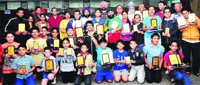 Winners of the Creative Table Tennis Club Tournament with their prizes in Ludhiana.