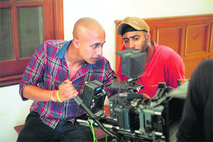 Navjit Buttar (R) handles the Red Epic camera