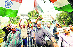 A protest outside the residence of Finance Minister Arun Jaitley over the black money issue in New Delhi on Sunday