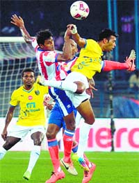 Players of Kerala Blasters and Atletico De Kolkata get into a tangle