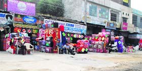 A footpath encroached upon in the Putligarh area in Amritsar on Monday