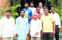 Kin of deceased Veerpal Singh in front of the DIGs office in Bathinda on Monday. Tribune photo