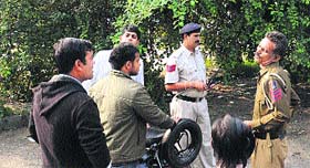 The police at the site where the body of a man was found near the Old Districts Courts in Sector 17, Chandigarh, on Monday.