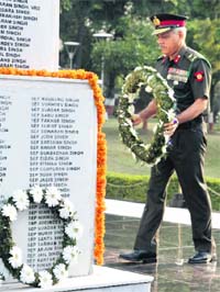Maj Gen AK Singh, the senior-most Infantry officer at Headquarters Western Command, lays a wreath at the Veer Smriti war memorial on Infantry Day in Chandimandir on Monday.
