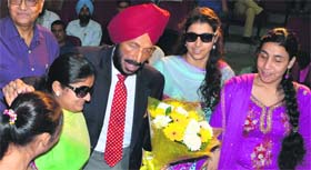 Flying Sikh Milkha Singh interacts with visually challenged children during a function at Bal Bhawan, Sector 23, Chandigarh, on Monday.