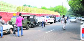 Parking chaos increases as vehicles are lined up outside DAV College, Sector 10, in Chandigarh.