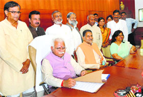CM Manohar Lal Khattar with Cabinet Minister Ram Bilas Sharma and Chief Secretary Shakuntla Jakhu after the Cabinets first meeting in Chandigarh on Monday.