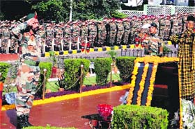 Chief of Staff of the Northern Command Lt Gen HJS Sachdev pays tribute at Dhruva Shahid Smarak during the Infantry Day celebrations in Udhampur district on Monday