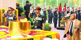 Rich tributes: Army chief General Dalbir Singh Suhag and Lt Gen Chandra Shekhar (retd) pay tributes at Amar Jawan Jyoti on 68th Infantry Day in New Delhi on Monday