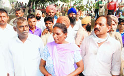 Relatives of the victims killed in the bus accident in Tarn Taran. tribune photo: Gurbax Puri