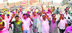 BJP workers celebrate the induction of Ram Pratap Sadhu as Cabinet Minister in Hanumangarh on Monday. Tribune Photo