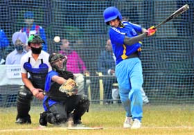 A player of Gujarat hits a shot against Chhattisgarh