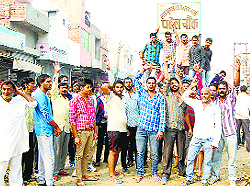 Residents hold a demonstration and block traffic at Rania Gate in Sirsa on Tuesday
