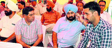 Applicants at the auction for properties by the Jalandhar Development Authority on Tuesday. 