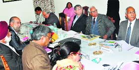 Governor NN Vohra chairs a meeting of the University of Kashmir Council at Raj Bhawan in Srinagar on Monday.