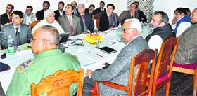 Governor NN Vohra chairs a meeting of the State Managing Committee of the Indian Red Cross Society at Raj Bhawan in Srinagar on Tuesday.