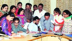 BJP candidates file nominations at the District Magistrates office in Dehradun on Tuesday. Tribune photo: Abhyudaya Kotnala