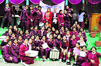 Elated winners of the trophy during the 126th annual athletics meet at Oak Grove School in Mussoorie on Tuesday. A Tribune photograph