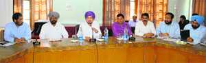 Chief Information Commissioner SS Channy holds a meeting with district officials at Bachat Bhawan in Amritsar on Wednesday