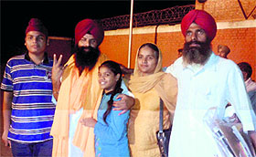 Lakhwinder Singh Lakha (second from left) with his sister and brother after being released from the Burail Jail in Chandigarh on Wednesday. 