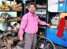 An industrialist shows the broken locker in the Industrial Area, Phase I, Chandigarh, on Wednesday. 