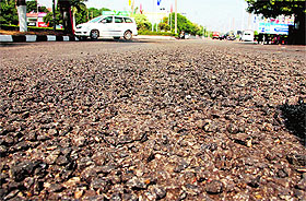 A damaged portion of the recently recarpeted road near Shalimar Mall in Panchkula on Wednesday. 