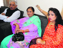 Haryana Rajya Mahila Ayog vice-chairperson Suman Dahiya (in red sari) in Jagadhri on Wednesday.