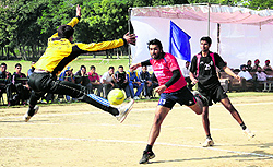 Players in action during a match of the 63rd All-India Police Volleyball Cluster Championship in Jalandhar on Wednesday