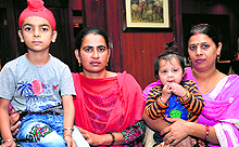 One-year-old Manvi and six-year-old Jashanpreet with their mothers in Jalandhar