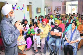 Special educator from the UK Arvinder Singh Paul addresses a gathering on the premises of Ashirwad, an NGO, in Ludhiana