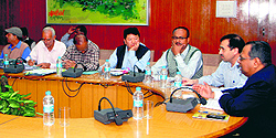 Uttarakhand Chief Secretary N Ravi Shankar holds a video conference on forest land transfer with District Magistrates in Dehradun on Wednesday