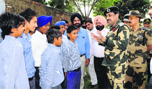 BSF DIG MF Farooqui sensitises schoolchildren on cleanliness during the Swachh Bharat Abhiyan at Khalra on Thursday