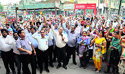 Members of the United Forum of Bank Unions stage a demonstration in Bathinda on Thursday