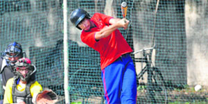 A player from Delhi returns a shot during a match in Sector 35, Chandigarh, on Thursday.