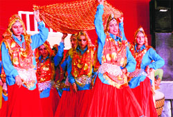 Students perform a group dance during the Ratnawali festival at Kurukshetra University on Thursday. Tribune photo