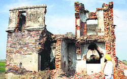 Remains of houses in Hondh Chillar village. File photo