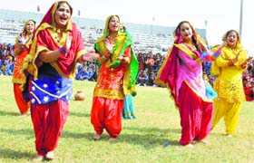 Women perform during the opening ceremony of Punjab State Women Games at Guru Nanak Stadium on Thursday.