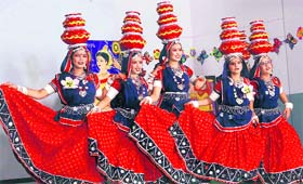 Students present an item during a dance competition at BCM Basant City