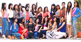 Models strike a pose with designers at a hotel in Ludhiana.