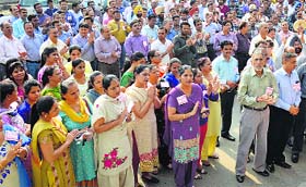 Members of the United Forum of Bank Unions demonstrate outside the State Bank of India at Civil Lines in Ludhiana.