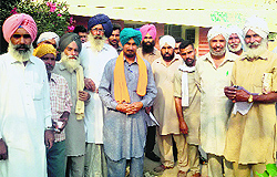 Dejected farmers outside the office of the Plant Protection Officer in Muktsar on Thursday