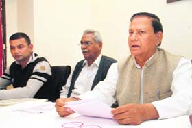 Congress MLA Hira Singh Bisht, president of the Uttrakhand Cricket Association, addresses mediapersons