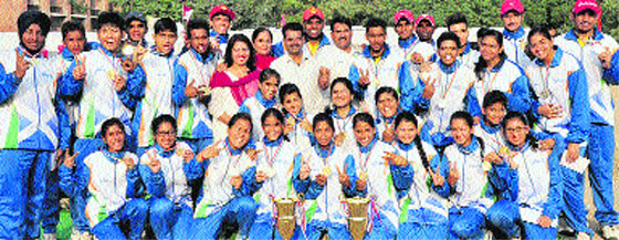 The boys and girls baseball teams of Chandigarh pose with the trophies at Government Model Senior Secondary School, Sector 35, Chandigarh, on Friday . Tribune photo:Parvesh Chauhan