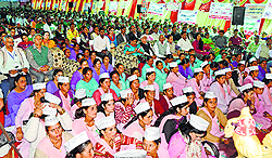 Participants during the state-level sanitation programme in Mandi on Friday