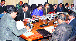 Urban Development Minister Sudhir Sharma presides over a meeting in Shimla on Friday