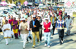 BJP leaders and workers take part in the Run for Unity at Mandi