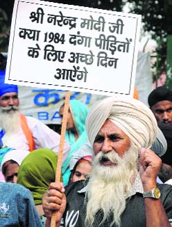 1984 riot victims protest in New Delhi on Friday.